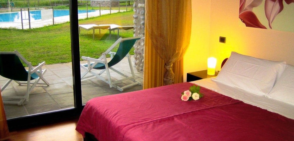Le camere dell'agriturismo Corte Carnevale